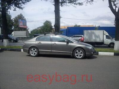 ��������� �� ����� Thule ��� Honda Civic ����� � �������������� ����������� 