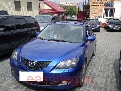    Thule  Mazda 3    