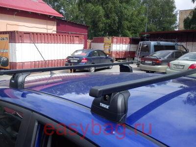 Багажники на крышу Thule для Subaru Impreza хетчбек/седан с прямоугольной поперечиной