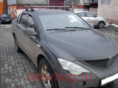    Thule  SSANGYONG Actyon    (754  962  1448)
