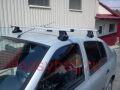 Багажники на крышу Thule для Renault Simbol с аэродинамичной поперечиной