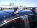 Багажник на крышу Thule для Ford Kuga без рейлингов (Форд Куга) прямоугольные стальные поперечины 754х762х1671