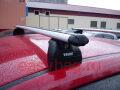 Багажники на крышу Thule для Subaru Impreza хетчбек/седан с аэродинамической поперечиной